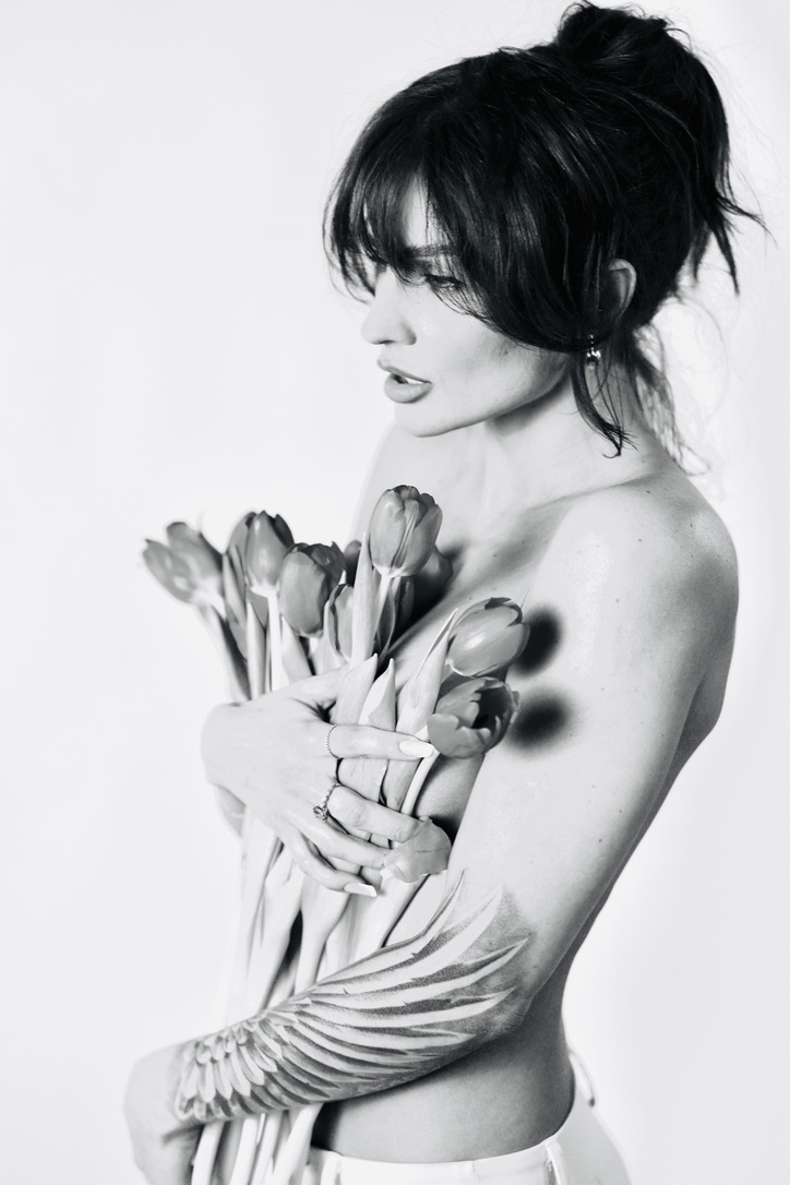 High-key portrait with tulips, profile view